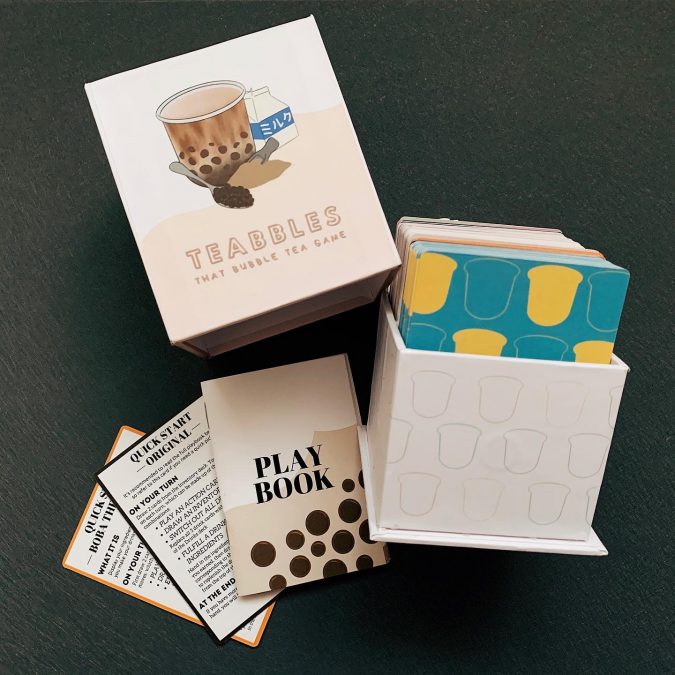 An overview shot of Singaporean board game, Teabbles, and its contents.