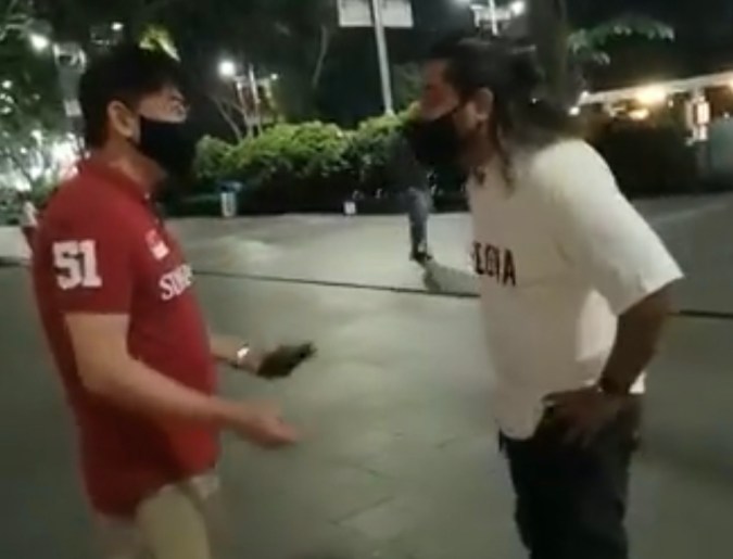 Lecturer Mr. Tan Boon lee approaches a mixed race couple and scolds the male involved for preying on Chinese women. 